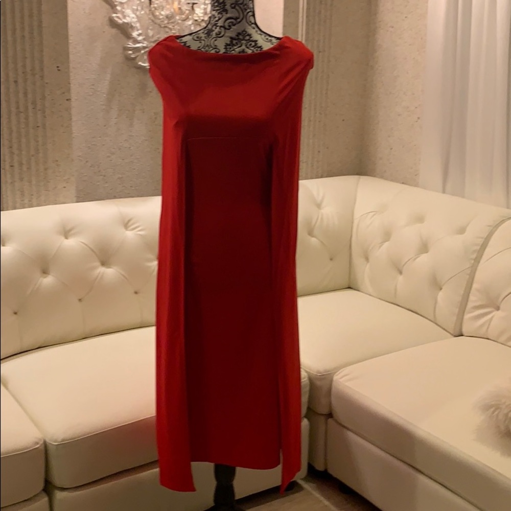 Bright red cape dress.